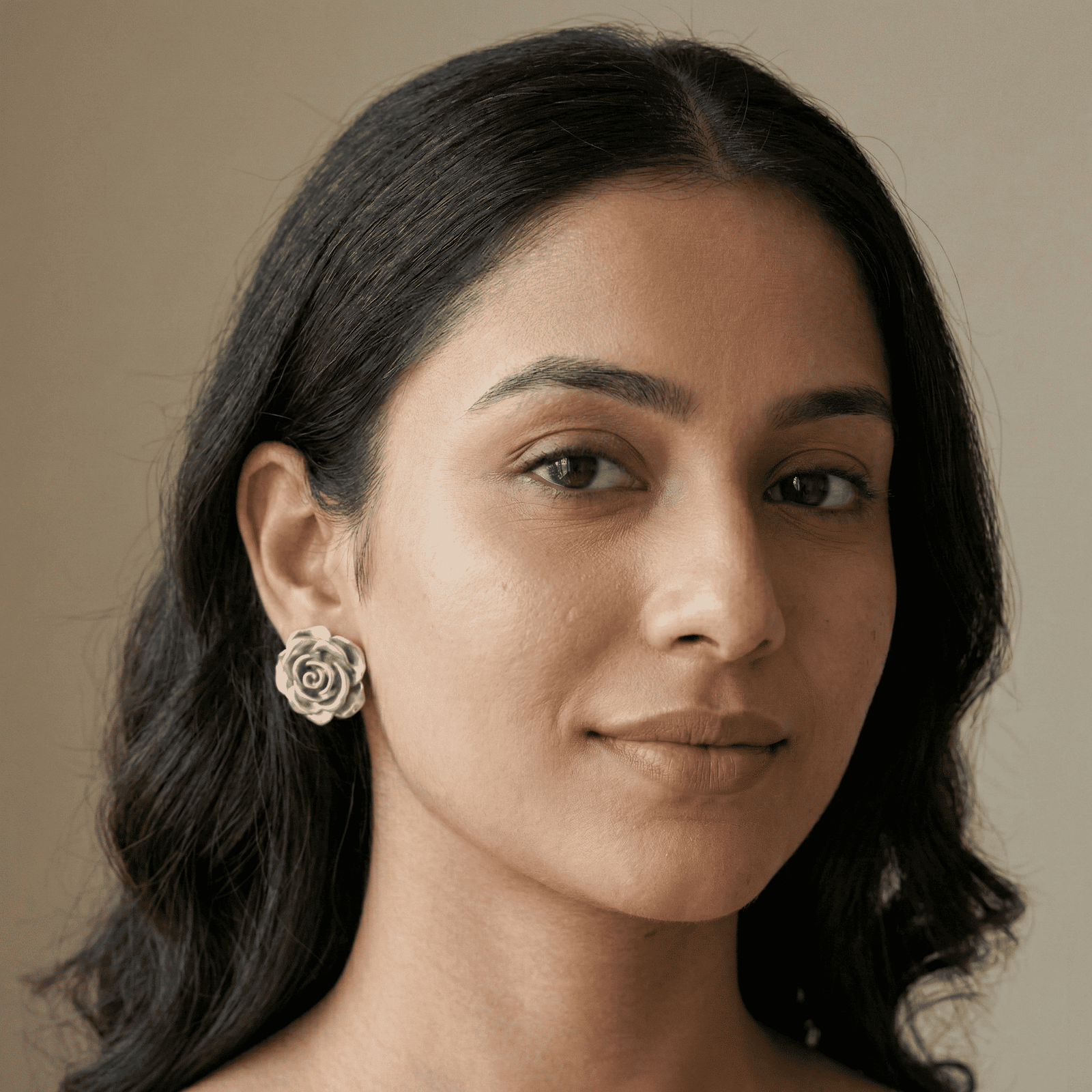 Woman wearing 3D Silver-Tone Rose Stud Earrings side profile