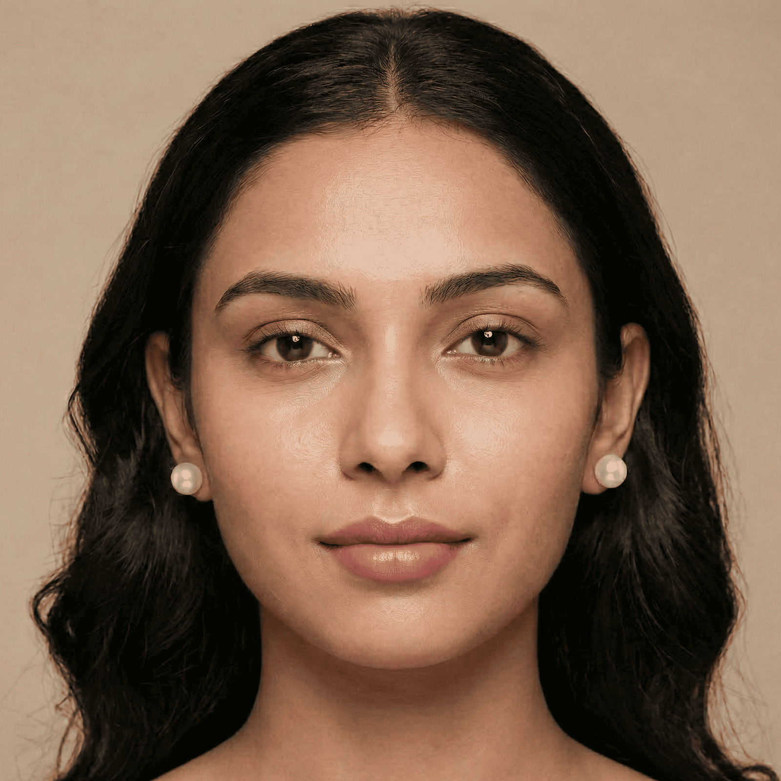Woman wearing pearl stud earrings combo