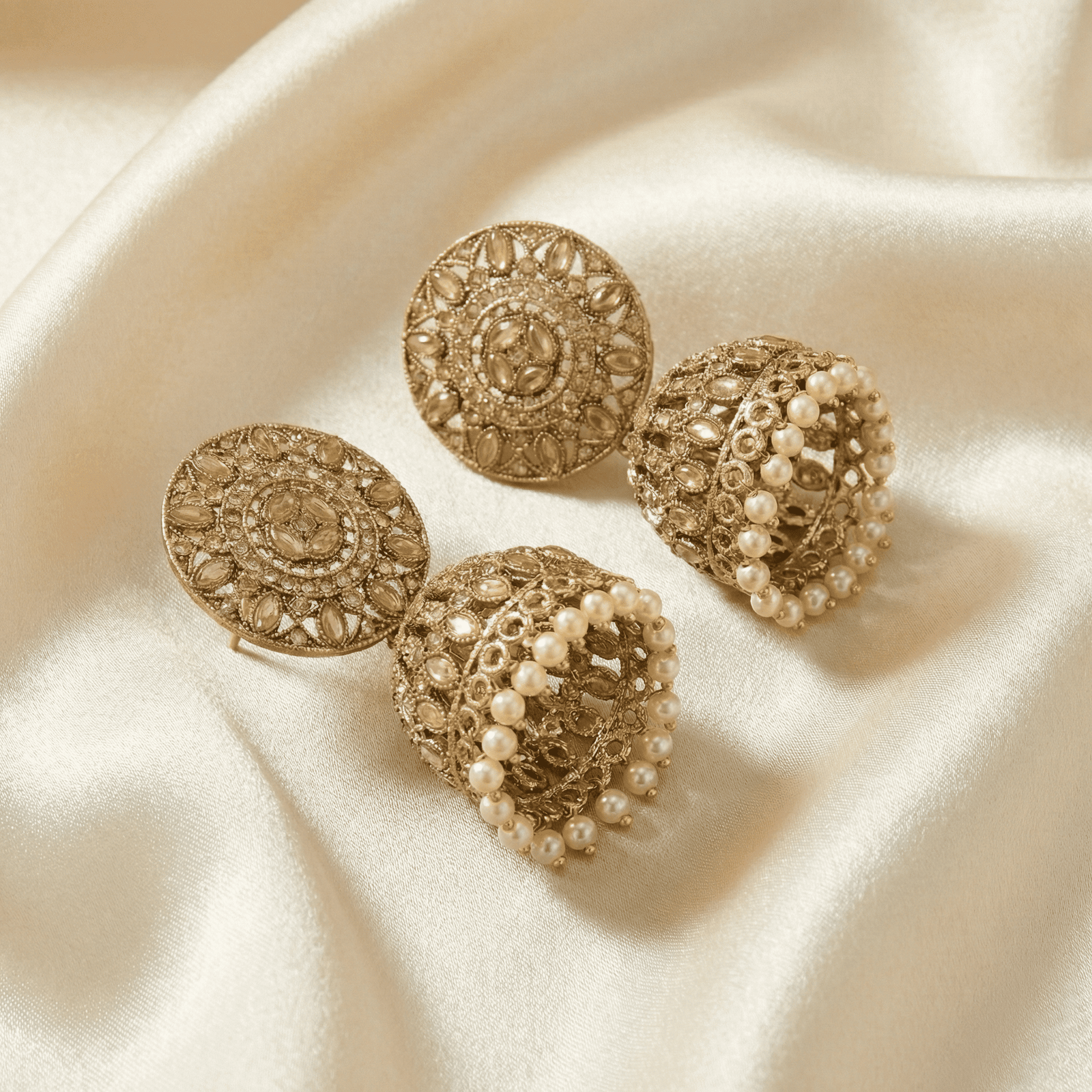 Antique gold pearl drop jhumka earrings flat lay photography