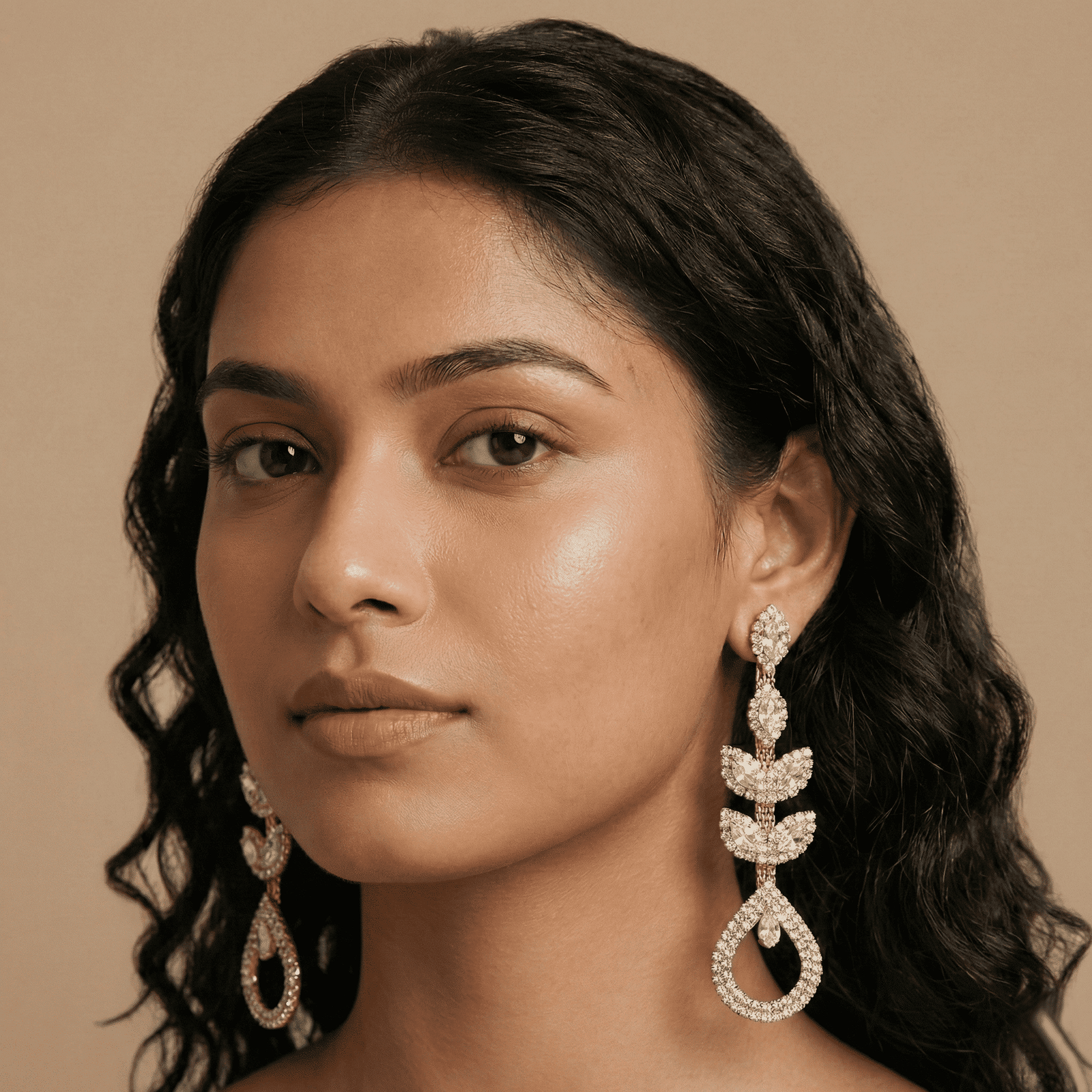 Model showcasing crystal vine drop earrings for women by Eshanarya
