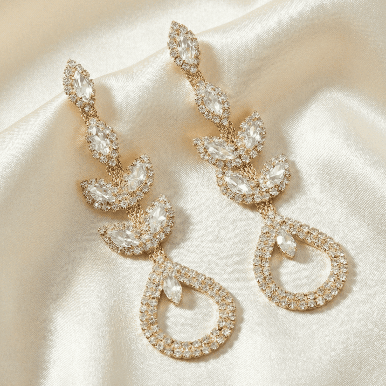 Designer crystal vine earrings with pear-shaped drop pattern