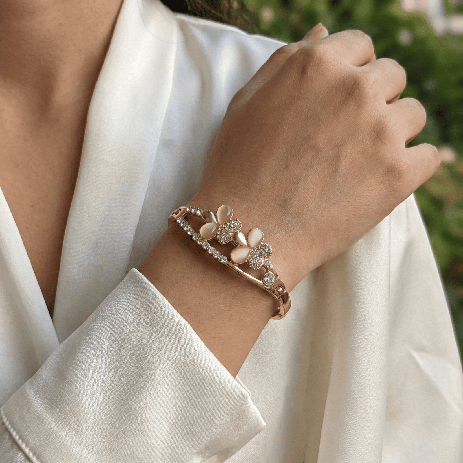 Women’s floral crystal bracelet with lightweight open cuff design