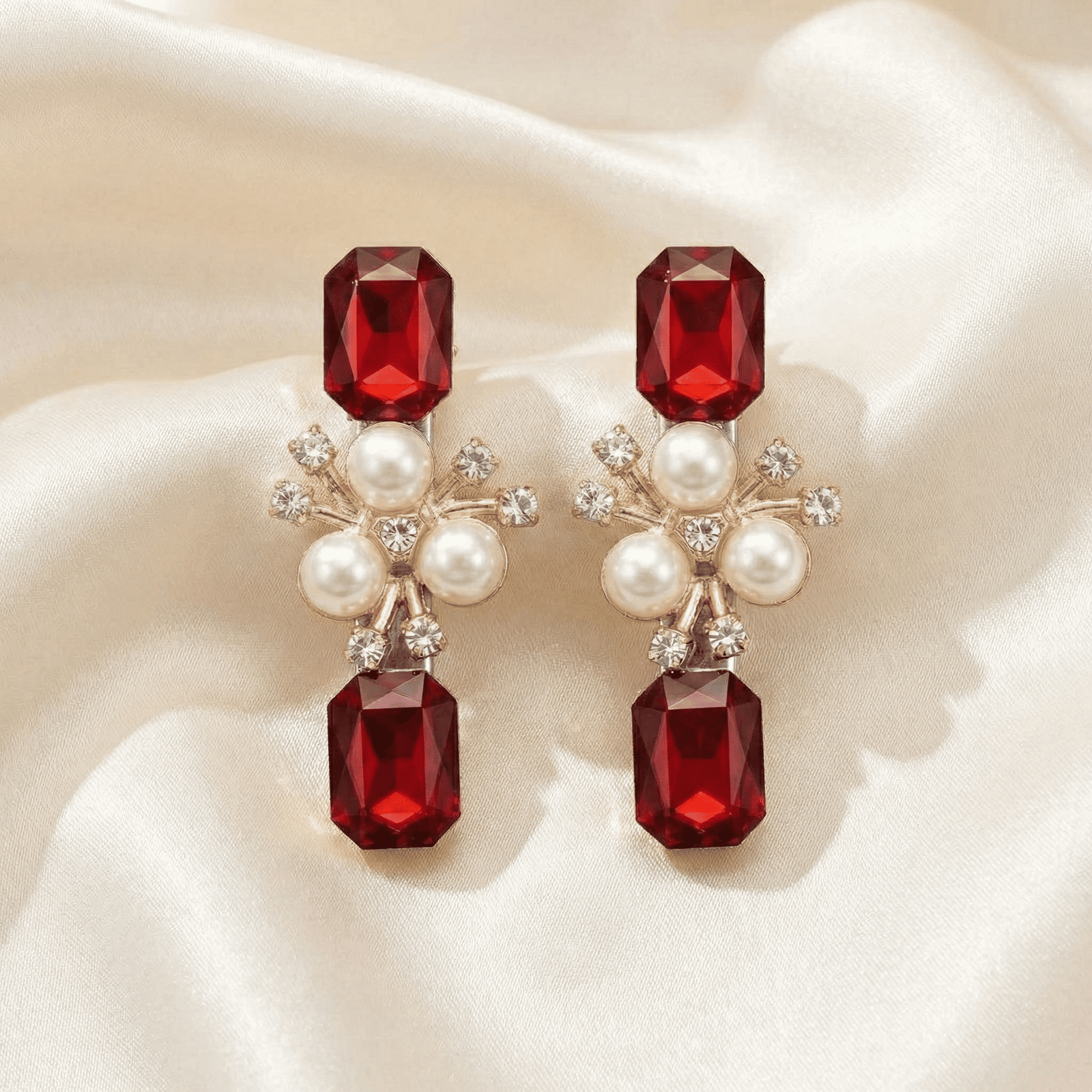 Ruby crystal hair accessory on satin fabric