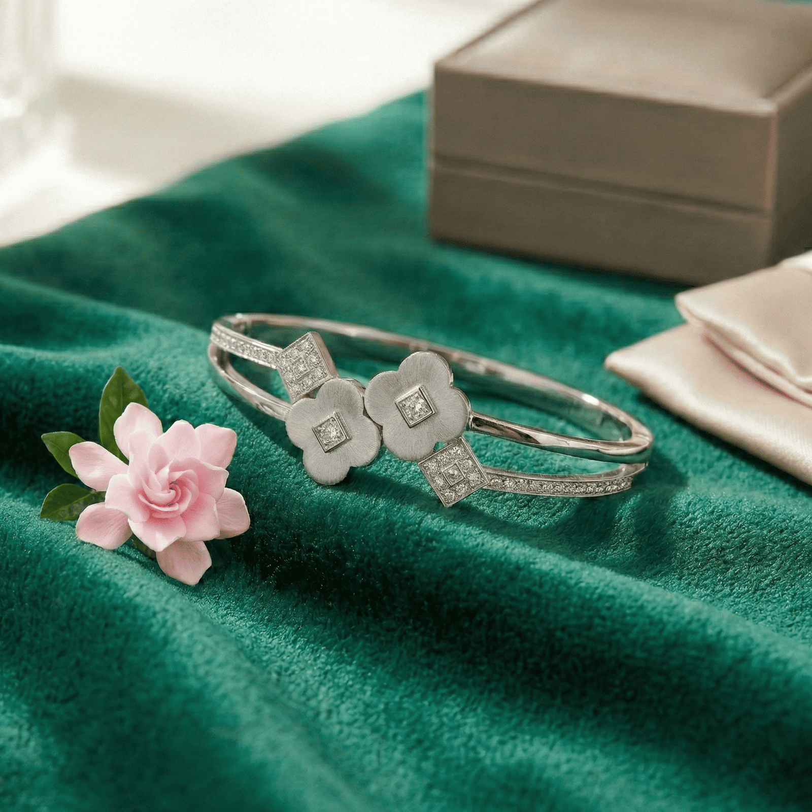 Silver floral motif bracelet for women with pink flower styling setup
