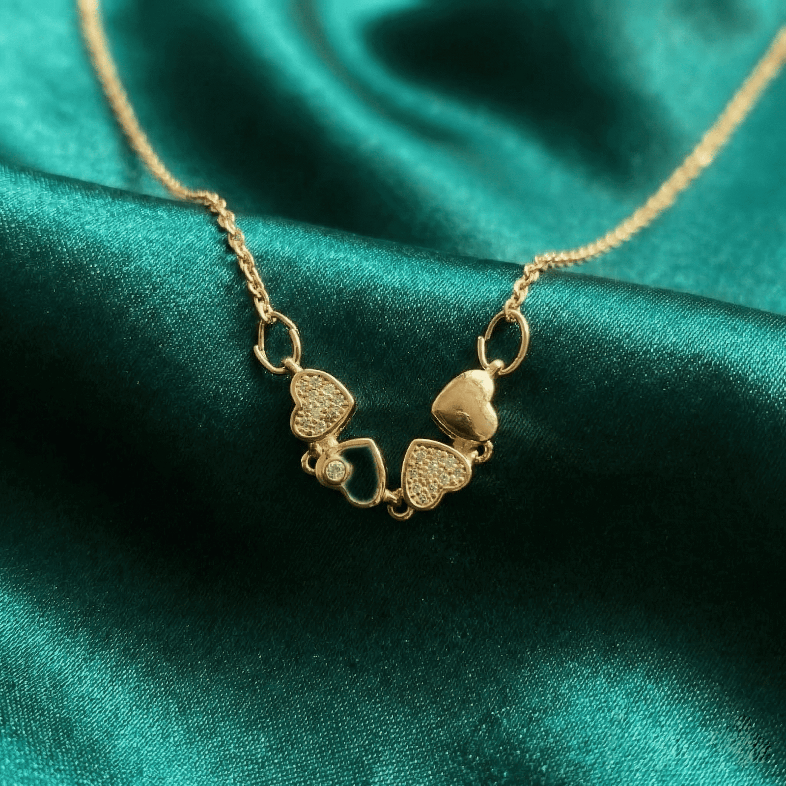 Minimal gold pendant necklace with crystal heart detailing