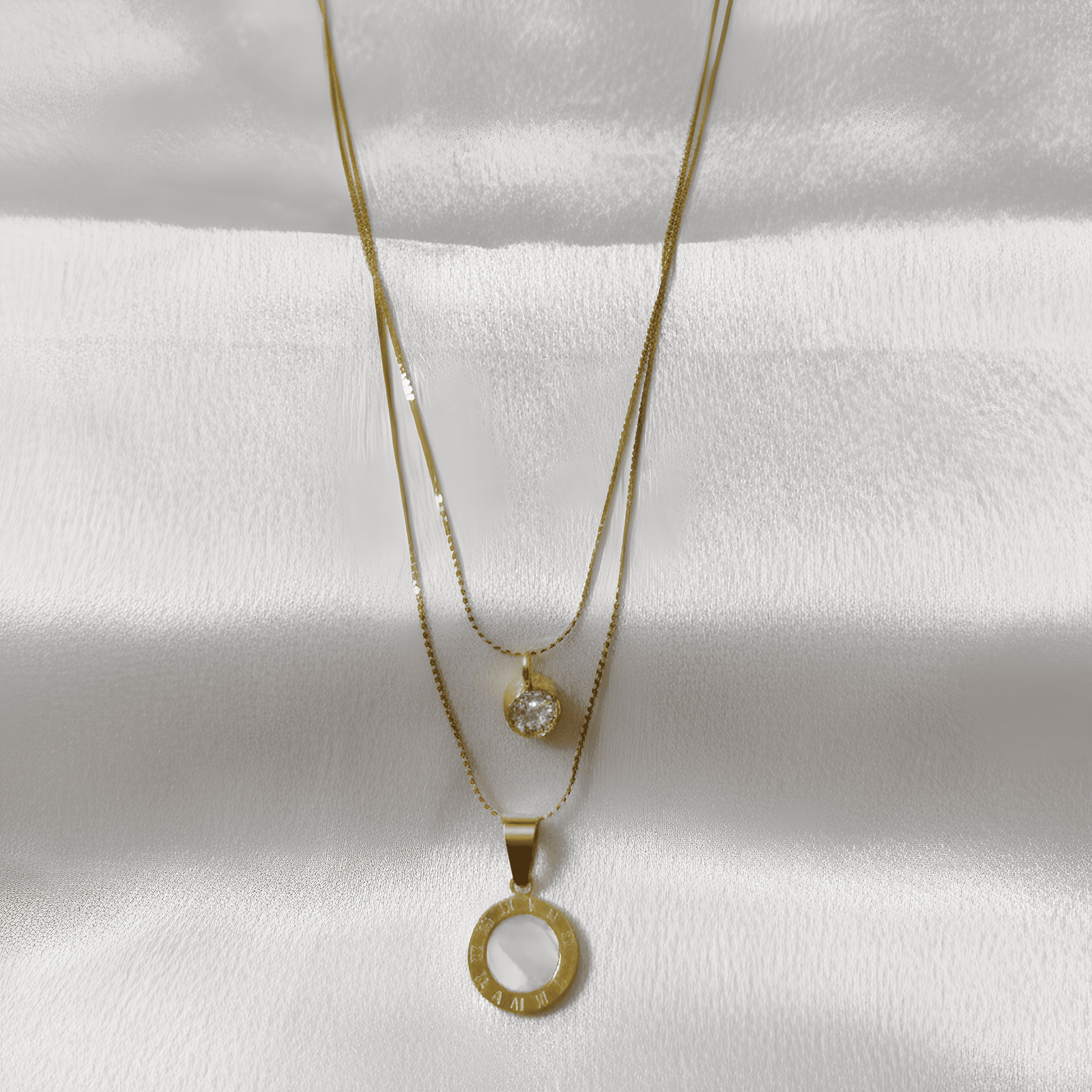 Layered gold pendant necklace for western outfit styling