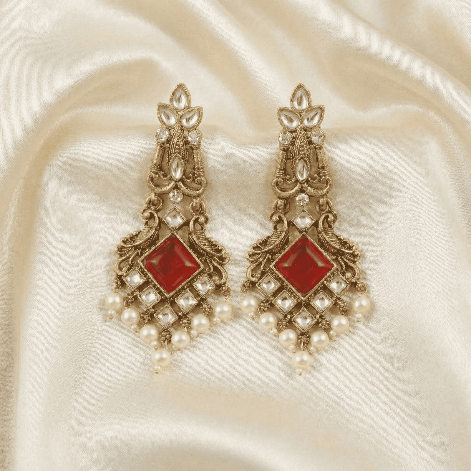 Statement red kundan pearl earrings for wedding and festive ethnic wear