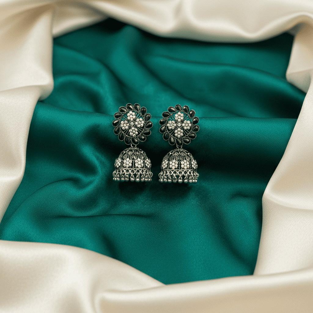 Statement oxidised earrings for women on satin background
