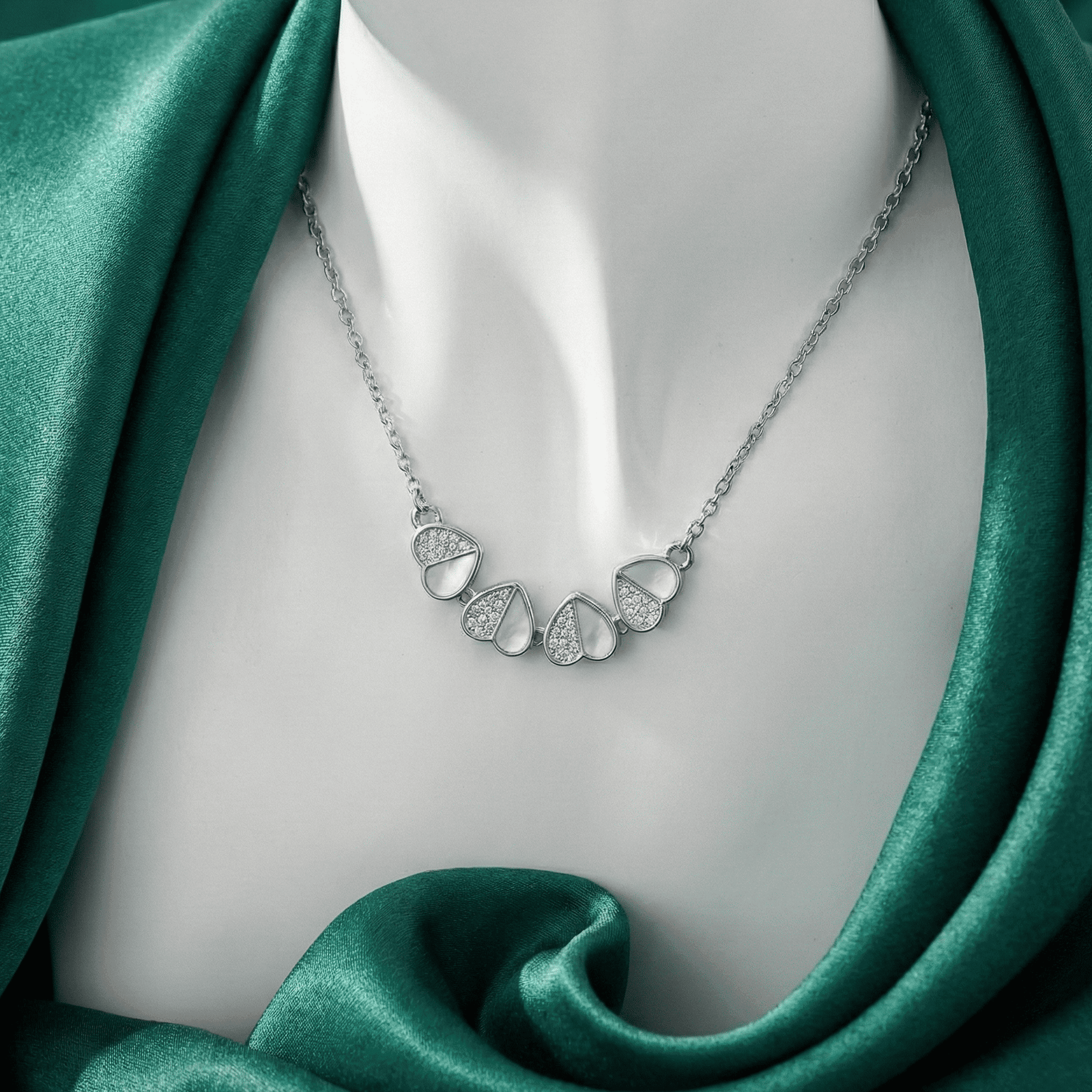 Eshanarya silver pendant necklace with heart floral design