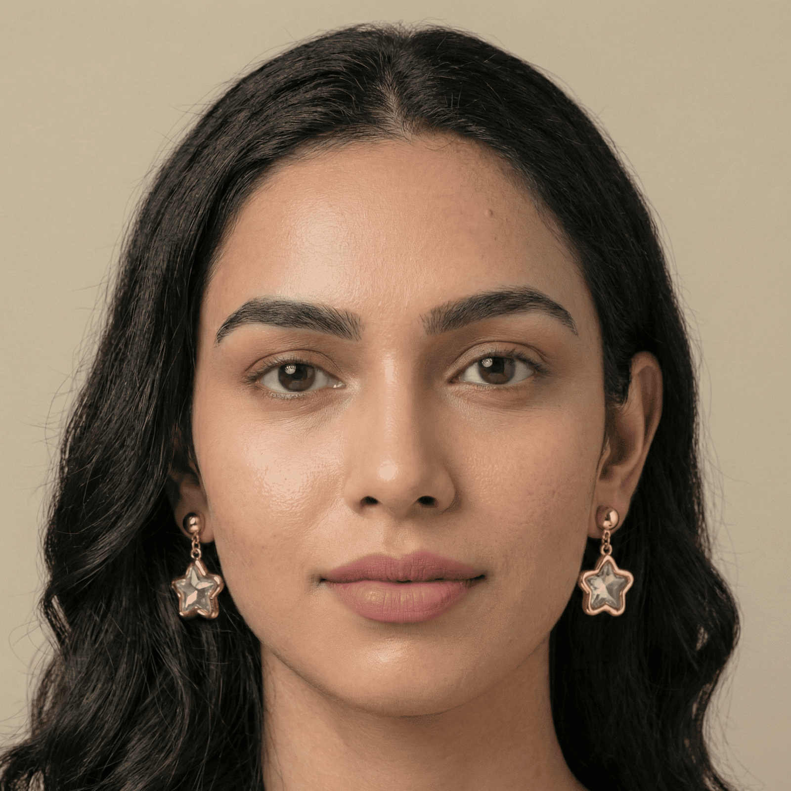 Front view of woman wearing crystal star drop earrings for women by Eshanarya