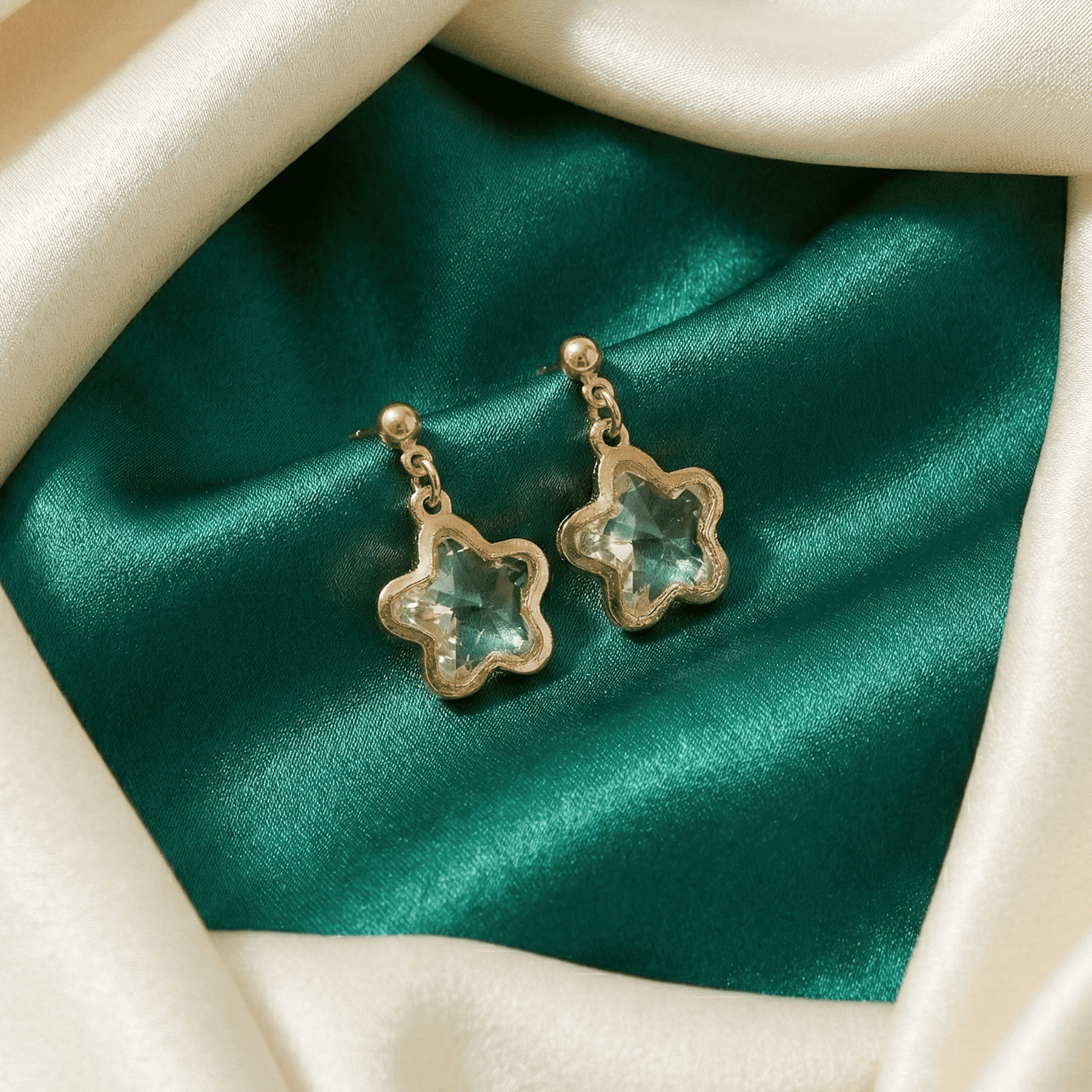 Lightweight crystal drop earrings with star shaped clear crystal design
