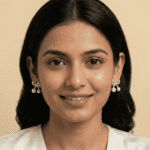 Woman wearing pearl ribbon stud earrings