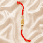 Crystal Pearl Designer Rakhi for Brother with crystal centrepiece, pearl beads and red sacred thread by Eshanarya for Raksha Bandhan