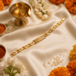 Eshanarya Om Bracelet Rakhi displayed with diya, rice, marigold flowers and jasmine blossoms for Raksha Bandhan celebration