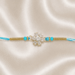 Front close-up of Eshanarya Sky Blue Snowflake Crystal Designer Rakhi for Raksha Bandhan
