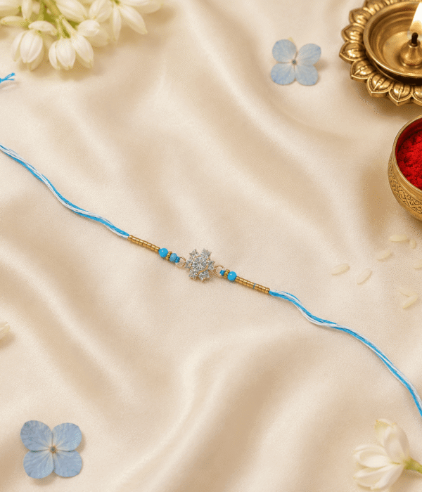 Eshanarya Sky Blue Crystal Snowflake Designer Rakhi for Brother