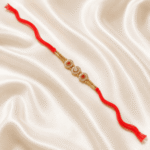 Angled view of Eshanarya Triple Crystal Floral Designer Rakhi with sparkling crystal floral design