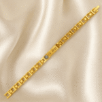 Angled View of Eshanarya Gold Bracelet Rakhi Featuring Blue Crystal and "Mere Bhaiya" Engraved Plate
