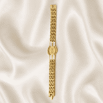 Top view of Eshanarya Radhe Radhe Bracelet Rakhi featuring a gold finish chain and engraved Radhe Radhe centrepiece.