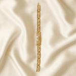 Top view of Eshanarya Jai Mata Di Bracelet Rakhi featuring a gold-finish linked bracelet and devotional engraved centre design.