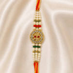 Close-up of Heritage Round Crystal Rakhi with Crystal Centre and Pearl Beads