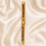 Vertical flat lay of Om Rudraksha bracelet rakhi with spiritual Om centrepiece and decorative rudraksha bead chain