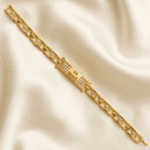 Premium Jai Mata Di Bracelet Rakhi for Brother showcasing a polished gold finish and geometric bracelet links.