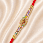 Detailed close-up of BRO designer rakhi featuring crystal border and colourful beadwork