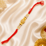 Top view of handmade Crystal Pearl Designer Rakhi featuring premium crystal detailing and pearl-inspired beads