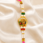 Front view of designer pearl Shree Rakhi with premium pink thread on satin cloth