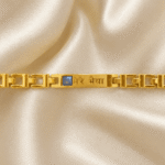 Close-Up of Eshanarya Bracelet Rakhi Showing Blue Crystal and "Mere Bhaiya" Hindi Engraving