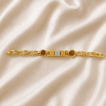 Front view of Eshanarya Gold Finish Om Rudraksha Bracelet Rakhi with crystal links, natural Rudraksha beads and devotional Om motif.
