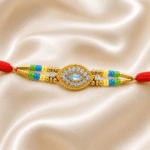 Close-up of eye-shaped crystal centerpiece with gold finish and multicolour bead detailing