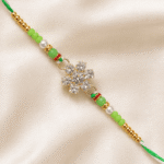 Luxury close-up of handcrafted green crystal Rakhi with premium decorative beads