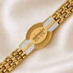 Macro image of the Eshanarya Radhe Radhe Bracelet Rakhi displaying the engraved spiritual centrepiece and premium gold finish.