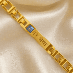 Close-Up of Eshanarya Bracelet Rakhi Featuring Blue Square Crystal and "Mere Bhaiya" Engraved Centre Plate