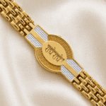 Detailed close-up of the Eshanarya Bracelet Rakhi with Radhe Radhe engraving, textured gold finish and minimalist bracelet links.
