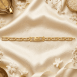 Festive flat lay of Eshanarya Jai Mata Di Bracelet Rakhi with diya, jasmine flowers and Raksha Bandhan décor.